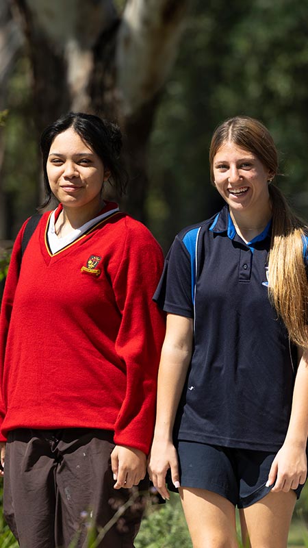 Marist Learning Zone. Students walking through garden.