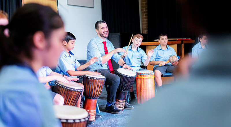 Catholic Schools Parramatta Diocese students in drumming lesson