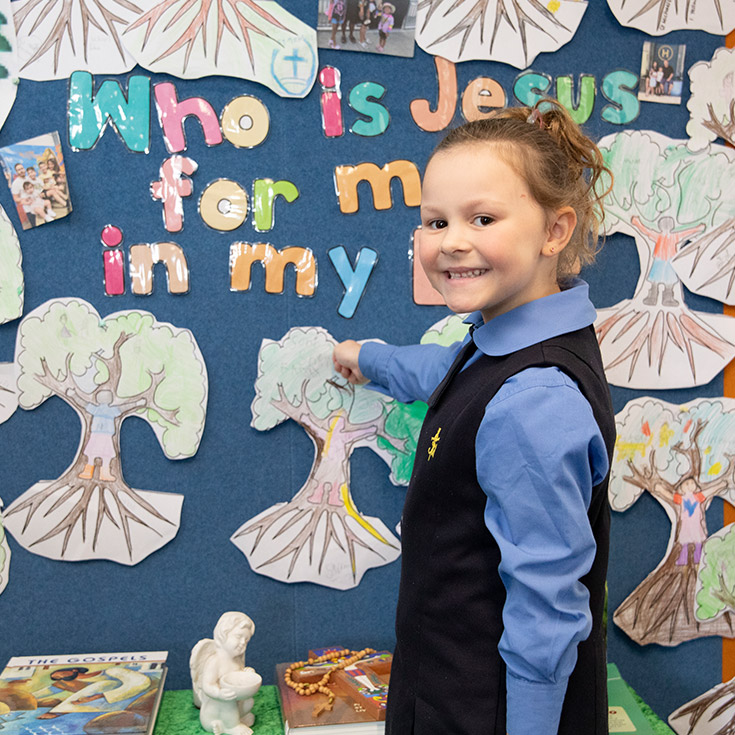 Happy student learning Religious Education in Catholic Schools Parramatta Diocese
