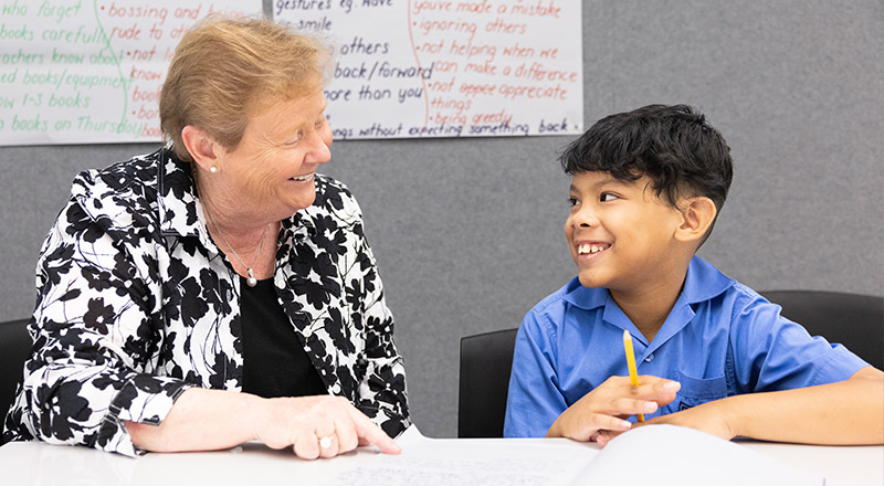 Our Lady of the Lords Seven Hills teacher with student
