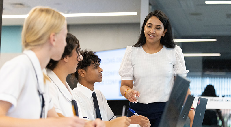 St Agnes Rooty Hill teacher instructing students