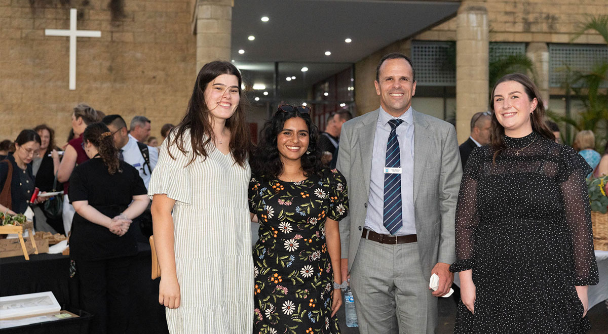 CSPD Leadership posing for photo outside of the Church